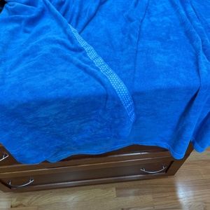 Wrappable stretch terry towel with velcro 34"" across-13 " when fastened